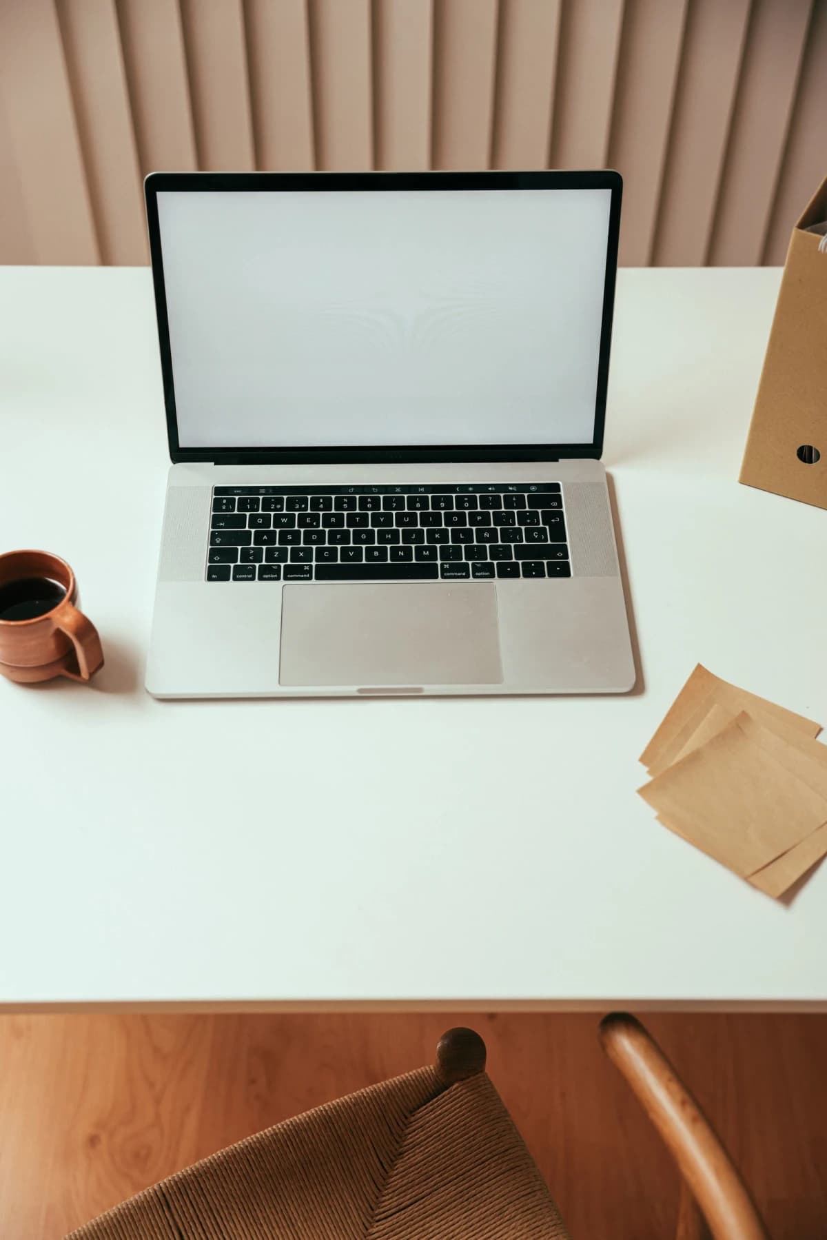 A laptop on a clean home office desk, representing the best budget laptops of 2026