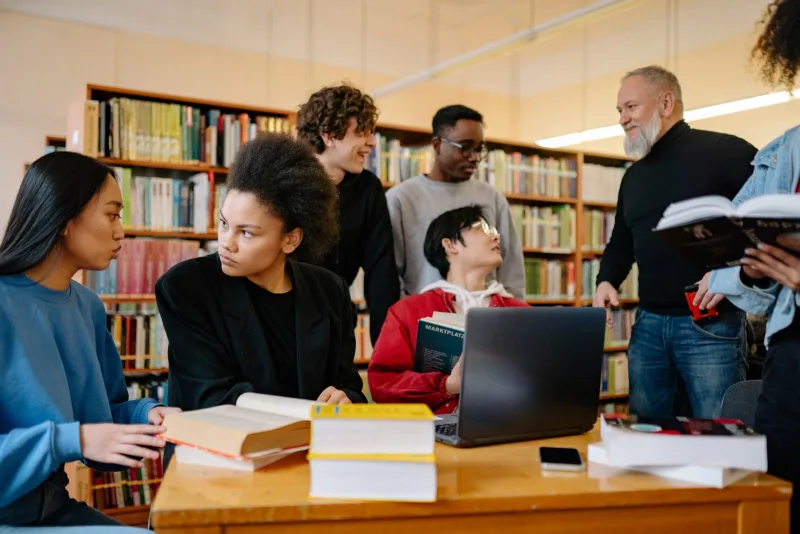 University students studying together in a library