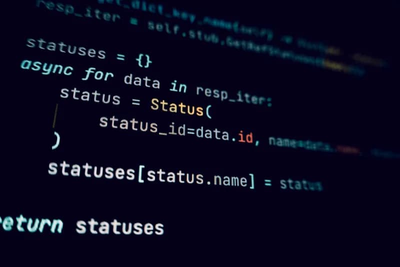 Programming code displayed in a dark theme on a computer screen